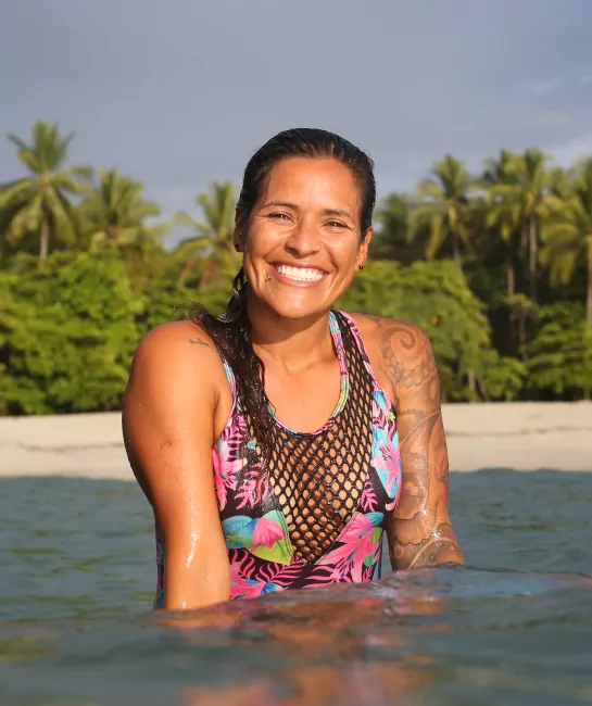 woman smiling wearing a swimwear