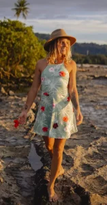 woman dressing a cute dress in the beach